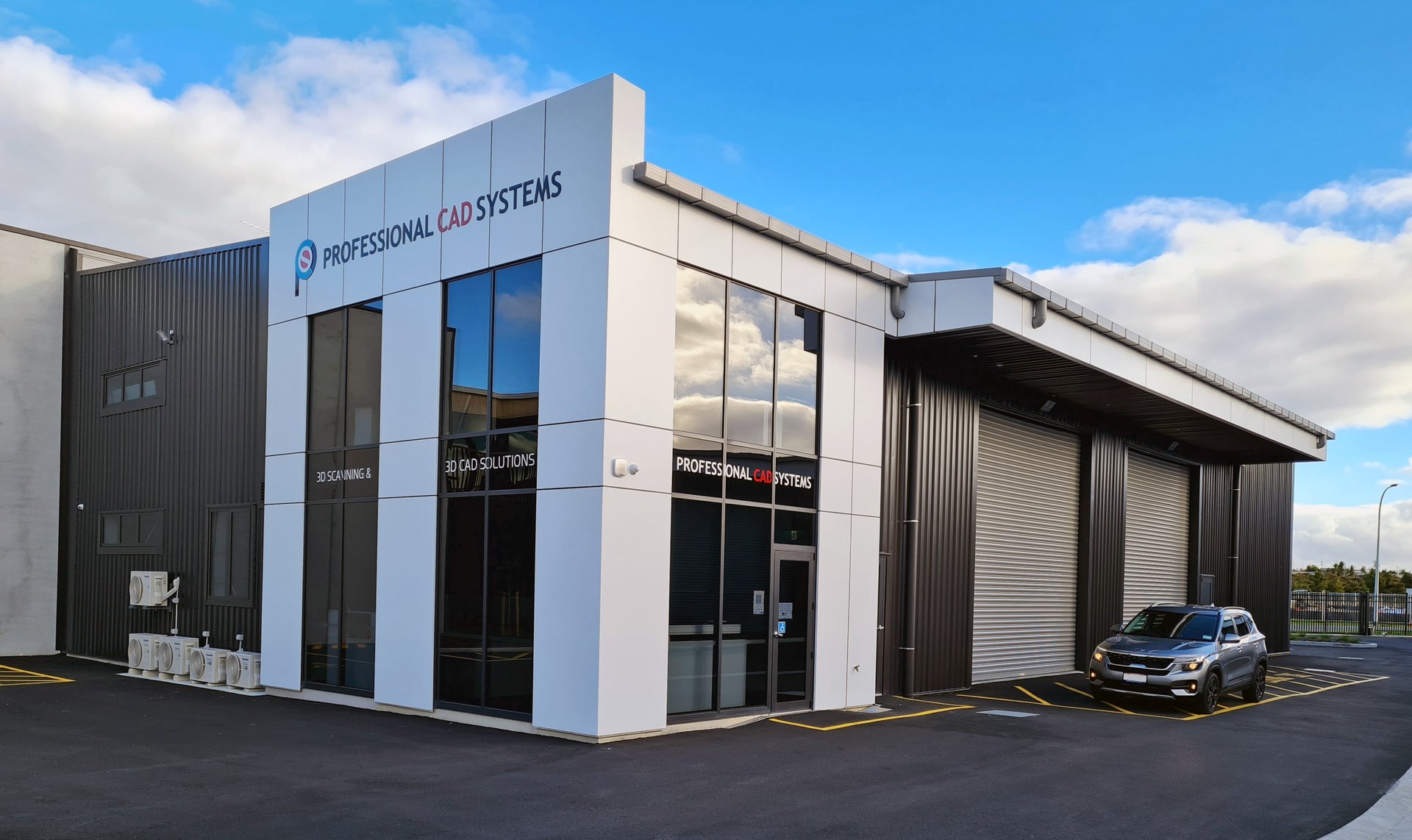 The Professional CAD Systems building in Te Rapa, Hamilton, with the company sign above the glass entrance