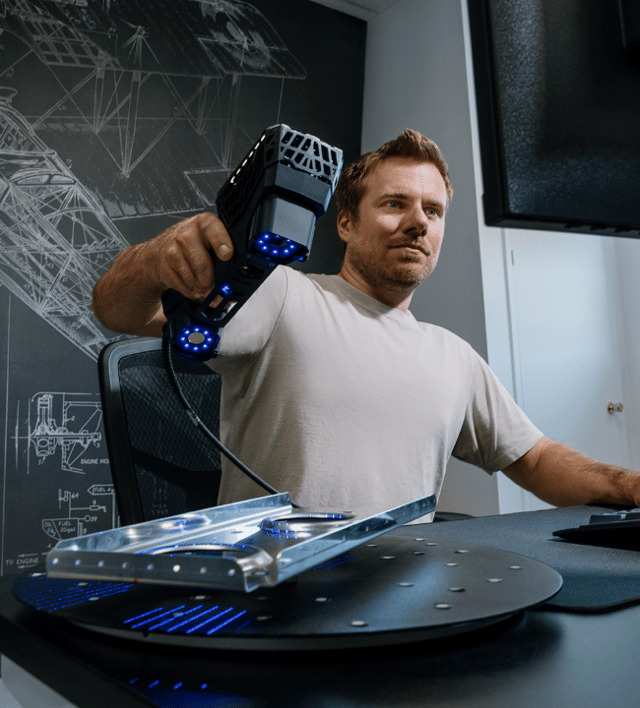 Students using the HandySCAN 3D EVO in an engineering lab