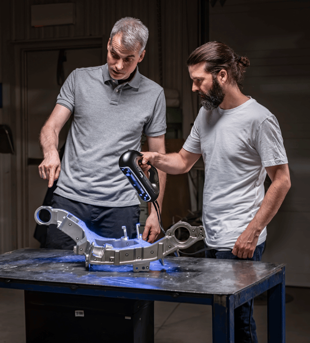 Students using the HandySCAN 3D PRO in an engineering lab
