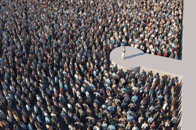 A crowd oriented towards a stage with Skatter Look-at control