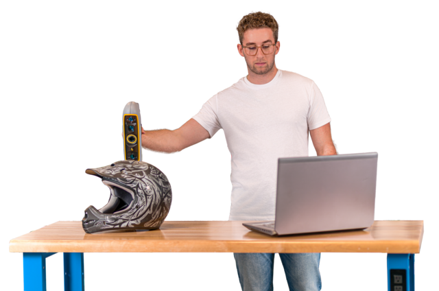 A designer scanning a chair for product development