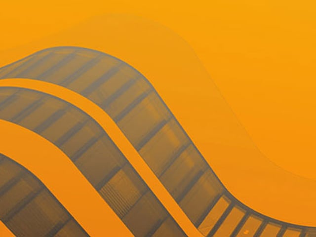 Orange architectural form representing SPIRIT CAD software