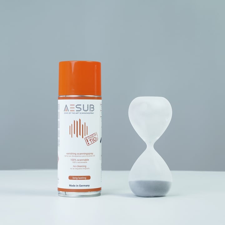 Complex hourglass-shaped part coated with AESUB Orange scanning spray
